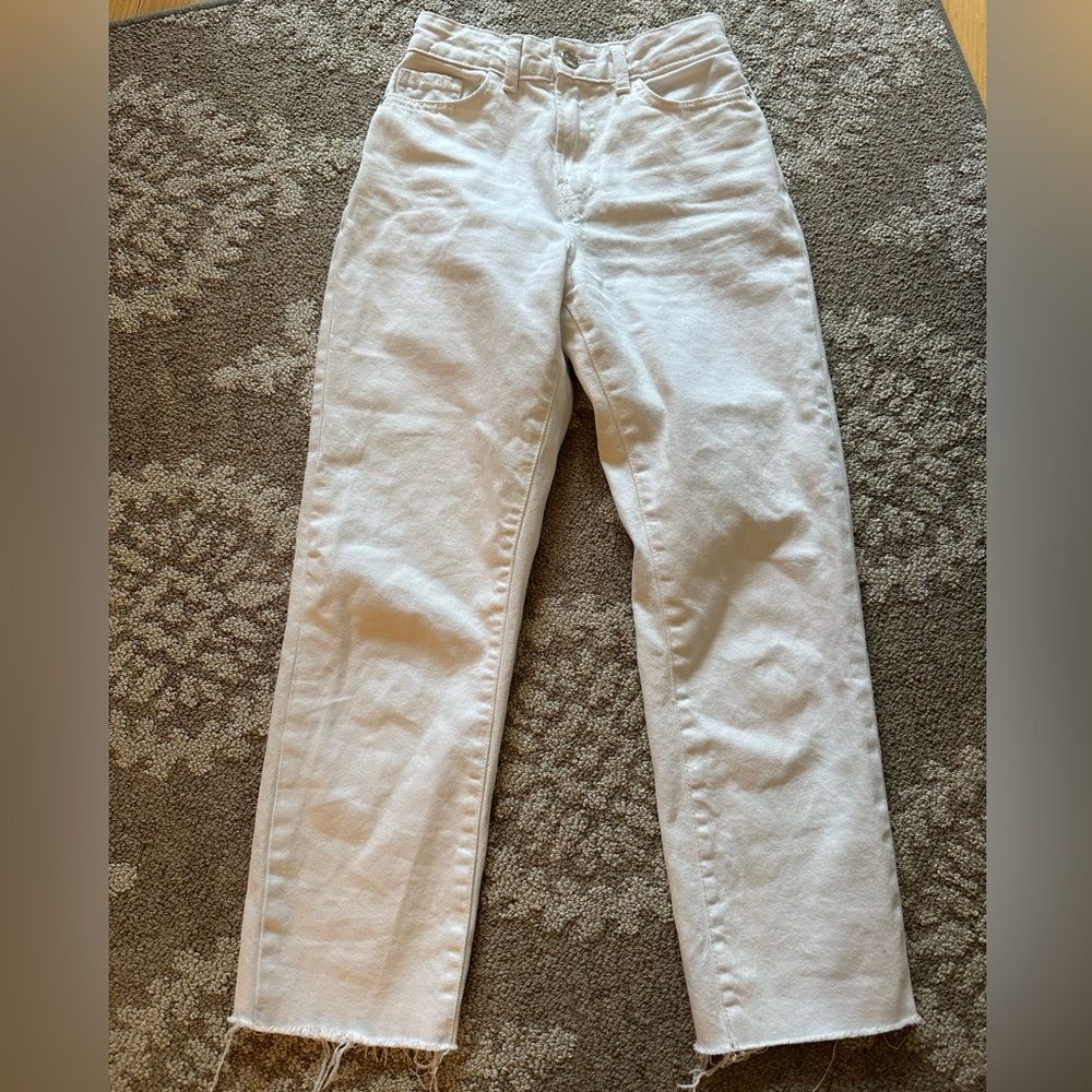 High waist white straight leg ankle jeans slightly frayed at the end